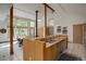 Bright living space with high ceilings, a breakfast bar and views to the exterior at 11220 S Deer Creek Rd, Littleton, CO 80127