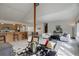 Spacious living space seamlessly connects the living room and kitchen areas at 11220 S Deer Creek Rd, Littleton, CO 80127