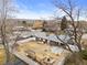 Aerial shot of property featuring the backyard, pergola, shed, and surrounding neighborhood at 6671 Chase St, Arvada, CO 80003