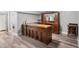 Basement with an at-home bar, with sink and storage at 6671 Chase St, Arvada, CO 80003