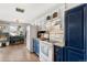 Spacious kitchen featuring updated appliances and ample counter space for cooking at 6671 Chase St, Arvada, CO 80003