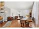 Spacious living room featuring hardwood floors, modern decor, and natural light at 6671 Chase St, Arvada, CO 80003