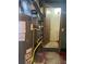 View of the basement featuring the homes updated performance furnace and utilities access at 6836 W 84Th Cir # 15, Arvada, CO 80003