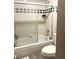 Well-maintained bathroom with a shower-tub combo and classic decor at 6836 W 84Th Cir # 15, Arvada, CO 80003