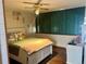 Cozy bedroom with hardwood floors, bright natural light, and plenty of dresser storage at 6836 W 84Th Cir # 15, Arvada, CO 80003