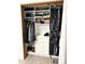 Organized closet with built-in shelving, drawers, and hanging space at 6836 W 84Th Cir # 15, Arvada, CO 80003