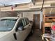 Spacious garage featuring a truck and door access to the main home at 6836 W 84Th Cir # 15, Arvada, CO 80003