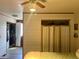 Spacious main bedroom featuring natural light, ceiling fan and separate access to a walk-in closet at 6836 W 84Th Cir # 15, Arvada, CO 80003