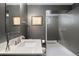 Modern bathroom featuring a sleek vanity, contemporary fixtures, and a clean, stylish design at 3330 E Tennessee Ave, Denver, CO 80209