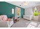Bright Bedroom features colorful floral curtains and a white crib at 3330 E Tennessee Ave, Denver, CO 80209