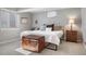 Cozy bedroom with natural light, a comfortable bed, and vintage-style chest for a unique look at 3330 E Tennessee Ave, Denver, CO 80209