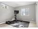 Home gym with stationary bike and weights for a convenient and healthy lifestyle at 3330 E Tennessee Ave, Denver, CO 80209