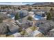 Aerial view of a residential neighborhood showcasing well-maintained homes, and snow dusted yards at 2059 June Ct, Castle Rock, CO 80104