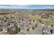 Overhead view of a residential community featuring well-maintained homes and scenic mountain views at 2059 June Ct, Castle Rock, CO 80104