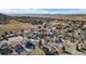 Panoramic aerial shot showcasing a neighborhood with lush greenery and a picturesque landscape at 2059 June Ct, Castle Rock, CO 80104