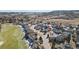 A neighborhood aerial view, showcasing proximity to a golf course at 2059 June Ct, Castle Rock, CO 80104