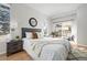 Cozy bedroom with a slider door and a large picture window, providing ample natural light and backyard views at 2059 June Ct, Castle Rock, CO 80104