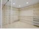 This walk-in closet boasts an abundance of storage with extensive shelving and drawers at 5460 S Locust St, Greenwood Village, CO 80111