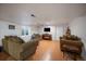 Spacious living room offering plenty of seating, natural light, and entertainment space at 11785 W Belleview, Littleton, CO 80127