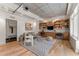 Bright living space featuring custom built-ins, modern furnishings, and hardwood floors at 1644 Little Raven St, Denver, CO 80202