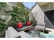 Outdoor patio featuring modern furniture, lush greenery, and privacy fencing at 1644 Little Raven St, Denver, CO 80202