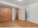 The bedroom features a large closet and wood floors at 1650 Bedivere Cir, Lafayette, CO 80026