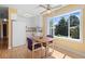 Bright dining area with a large window and views of the backyard at 1650 Bedivere Cir, Lafayette, CO 80026