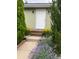 Charming front door entrance with plants, flowers, and trees at 1650 Bedivere Cir, Lafayette, CO 80026