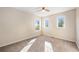 Bright bedroom with three windows offering lots of natural light at 21383 E Smoky Hill Rd, Centennial, CO 80015