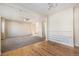 Hardwood and carpeted living space featuring an open floor plan and ample natural light at 21383 E Smoky Hill Rd, Centennial, CO 80015