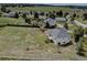 Aerial view of a charming home nestled in a serene wooded neighborhood at 34544 Columbine W Trl, Elizabeth, CO 80107