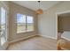 Bright dining area with a large window and access to the outdoors at 34544 Columbine W Trl, Elizabeth, CO 80107