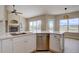 Spacious kitchen with stainless steel appliances and large center island at 34544 Columbine W Trl, Elizabeth, CO 80107