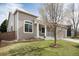 Charming one-story home with a manicured lawn and inviting front porch at 9640 Sydney Ln, Highlands Ranch, CO 80130