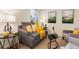 Comfortable living room featuring a couch and chairs, lots of light, and nice decor at 9640 Sydney Ln, Highlands Ranch, CO 80130