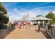 Community playground featuring a gazebo, swings, and various play structures at 9640 Sydney Ln, Highlands Ranch, CO 80130