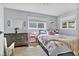 Comfortable bedroom showcasing a scenic view and closet at 32187 Sylvan Rd, Golden, CO 80403