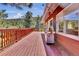 Spacious deck with barbecue grill perfect for outdoor cooking and entertaining with scenic view at 32187 Sylvan Rd, Golden, CO 80403