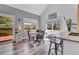 Bright dining room with natural light and views, perfect for enjoying meals and entertaining guests at 32187 Sylvan Rd, Golden, CO 80403