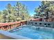 Hot tub on deck featuring beautiful views, perfect for relaxation and enjoying nature at 32187 Sylvan Rd, Golden, CO 80403