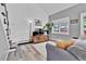 Spacious living room with deck access, comfortable seating, and modern design elements at 32187 Sylvan Rd, Golden, CO 80403