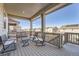 Private deck with rocking chairs and views of the community at 26285 E Canal Pl, Aurora, CO 80018