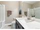 Modern bathroom featuring sleek vanity, and shower at 1721 Wingfeather Ln, Castle Rock, CO 80108