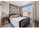 Cozy bedroom with natural light and stylish decor at 1721 Wingfeather Ln, Castle Rock, CO 80108
