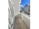 Private balcony with wood deck and views at 1335 S Danube Way # 105, Aurora, CO 80017
