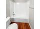 Full bathroom with shower/tub combo and wood floor at 1335 S Danube Way # 105, Aurora, CO 80017