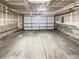 Attached garage with overhead door at 1335 S Danube Way # 105, Aurora, CO 80017