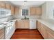 Neat kitchen with light wood cabinets and modern appliances at 1335 S Danube Way # 105, Aurora, CO 80017