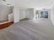 Bright and airy living room with neutral carpeting and ample natural light at 1335 S Danube Way # 105, Aurora, CO 80017