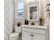 Stylish bathroom with a sleek vanity, modern fixtures, and ample natural light at 4588 S Versailles St # B, Aurora, CO 80015